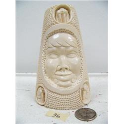 5-1/2" relief carved mammoth ivory chunk by Richard Miller carved with 3 walruses and man's face (11