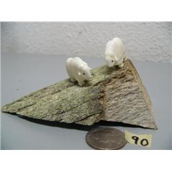 Pair of musk ox by Robert Kokuluk mounted on whale bone (2)