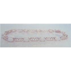 Opal Bracelet, 14 K yellow gold- opal are oval cabochon, approx. 4.00 carats, translucent, and semi-