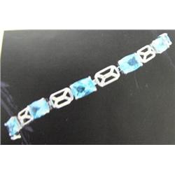 Blue Topaz Bracelet, 14 K white gold- blue topaz are emerald cut, approx. 11.00 carats, transparent,