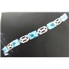 Image 1 : Blue Topaz Bracelet, 14 K white gold- blue topaz are emerald cut, approx. 11.00 carats, transparent,