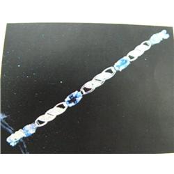 Tanzanite and Diamond Bracelet, 14 K white gold- tanzanite are oval, faceted, approx. 3.00 carats, t
