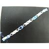 Image 1 : Tanzanite and Diamond Bracelet, 14 K white gold- tanzanite are oval, faceted, approx. 3.00 carats, t