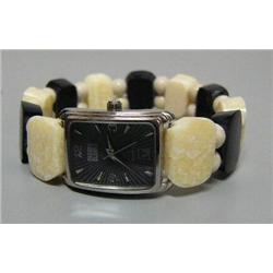 CHOICE on 2 ivory and baleen watch with quartz movement in excellent running condition (2)