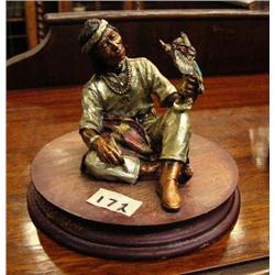 Indian With an Eagle Dancer on Knee, Mixed Media Cast Metal (129)