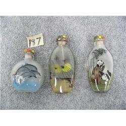 3 Snuff Bottles, glass and painted on inside:  1 has spider in a web, a has 3 porpoises and 1 has 2 