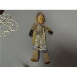 Choice on 3:  Chevak Dolls with Seal gut Rain Gear  A: Blue Print Dress (2)