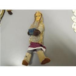 Choice on 3:  Chevak Dolls:  B: Purple Dress with Basket (2)