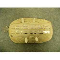 7" cribbage board done in walrus bone, relief carved with 2 eagles by Craig Niksik # 576F (2)