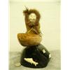 Image 1 : 12" soapstone hunter in a kayak mounted on Alaskan jade base # 529F (2)