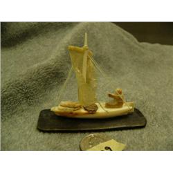 2.5" ivory one masted sailing boat with Eskimo hunter by Thomas Pushruk (deceased) in 2004 when he w