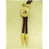 Image 4 : 2 ivory bolo ties circa 1950: carved walrus head with ivory drops, scrimshawed Eskimo picture with i