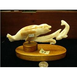 Fossilized ivory seal chasing salmon 7" long Steve Byazroy wood base BT6 (25)