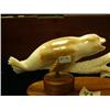 Image 2 : Fossilized ivory seal chasing salmon 7" long Steve Byazroy wood base BT6 (25)