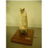Image 1 : Fossilized ivory carving by Gary Buttoner of falconer with falcon 6.5" tall mounted on wood base #BT