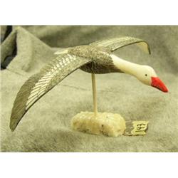Carved ivory flying snow goose (blue phase) by C. Kokuluk - 2-1/4" tall, 4-1/8" from tail feathers t