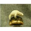 Image 1 : Carved ivory swimming seal mounted on fossilized ivory- 1-5/8" tall