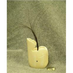 Carved ivory whale with hollow center and baleen coming out of blow hole done by Jerome Saclamana- i