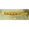 Image 2 : Skin umiak complete with 4 harpoons, 2 seal poke, and 4 oars- 12-3/4"