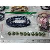 Image 4 : Bag of assorted costume jewelry