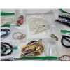Image 7 : Bag of assorted costume jewelry