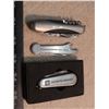 Image 1 : three stainless knives