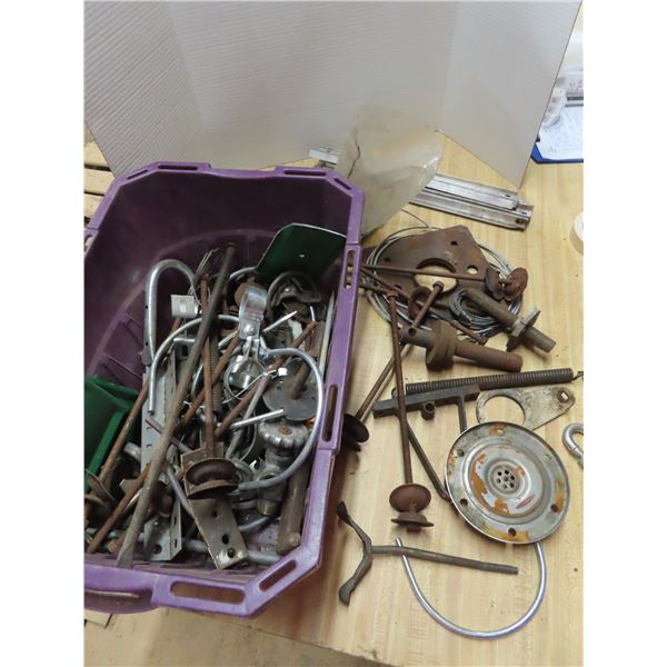 tote of hardware, overhead door parts, etc.