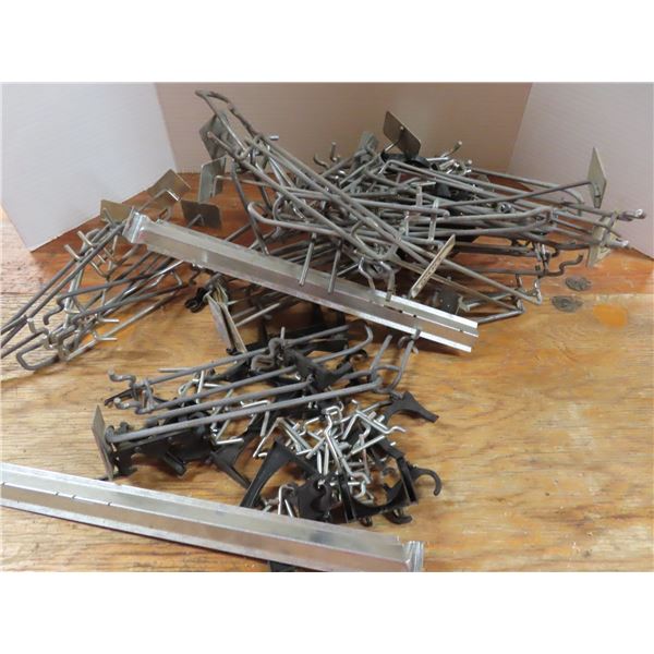 box of pegboard hooks and pieces