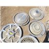 Image 5 : assorted vintage hubcaps and olsmobile hood emblem
