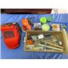 Image 1 : polisher, welding helmet, detailing accessories, etc.
