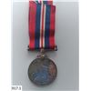 Image 1 : Original Canadian Gov't Issued Silver World War II War Medal with ribbon. 1.4 ounces silver, 38 gram