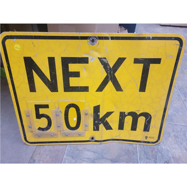 next 50 KM highway sign 23.5x17.5"