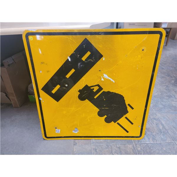 truck entering pavement highway sign 29.5" x 29.5"