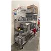 Image 1 : 4 tier heavy-duty metal shelving rack with contents - face shields/ spray bottles/ Scott roll towels