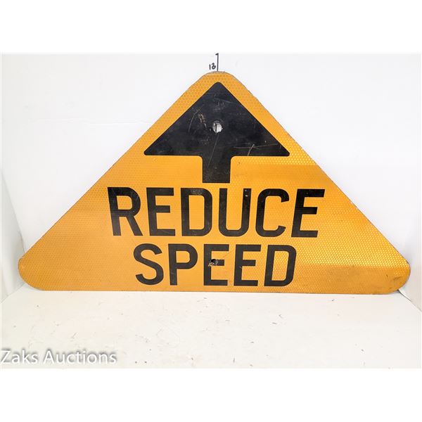 Decommissioned Reduce Speed Metal Sign