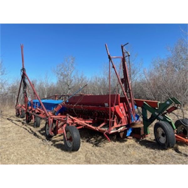 IH PressDrill 36’ - 3, 12’ sections c/w the grass seed attachment Very nice Clean Drill