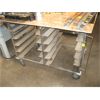 Image 1 : STAINLESS STEEL TRAY CART ON CASTORS W/STAINLESS STEEL TOP - TOP HAS BEND IN IT