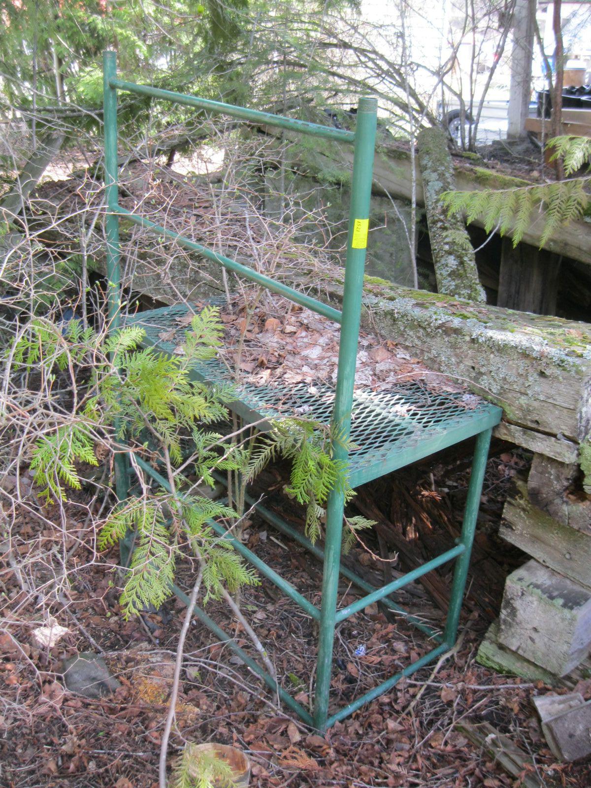 GREEN METAL STAIRS RACK
