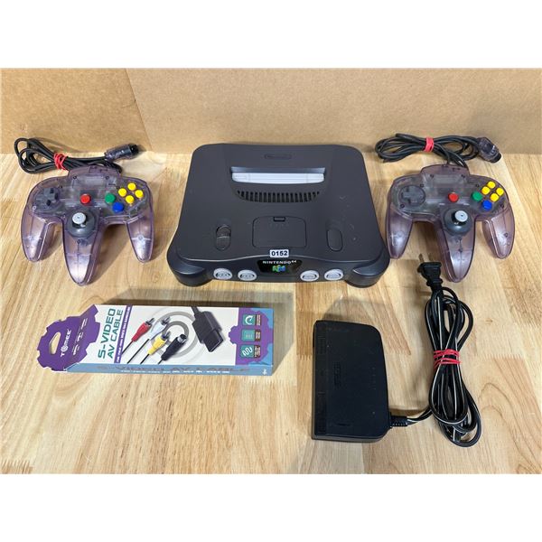 Lot of 1 Nintendo 64 + 2 Purple Transparent Controllers + Cords - Works