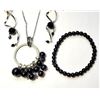 Image 1 : 10)  SET OF BLACK BEAD AND SILVER TONE BRACELET, D