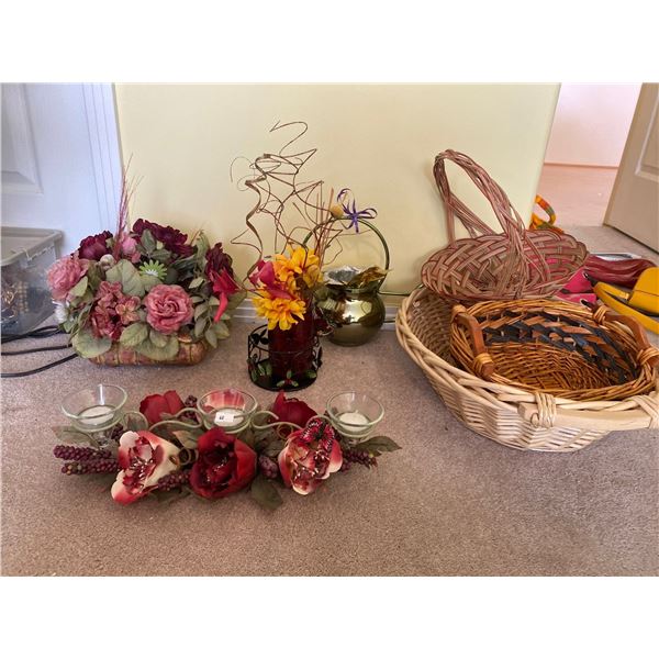 Wicker Baskets With Decorative Faux Flower Arrangments And Candle Holders