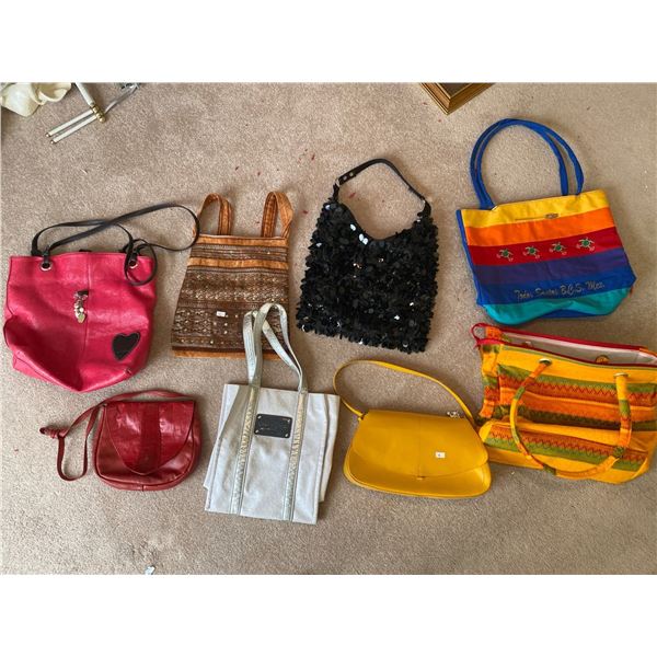 Assortment Of Colourful Purses And Tote Bags