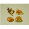 Four Amber Crystal Brooches