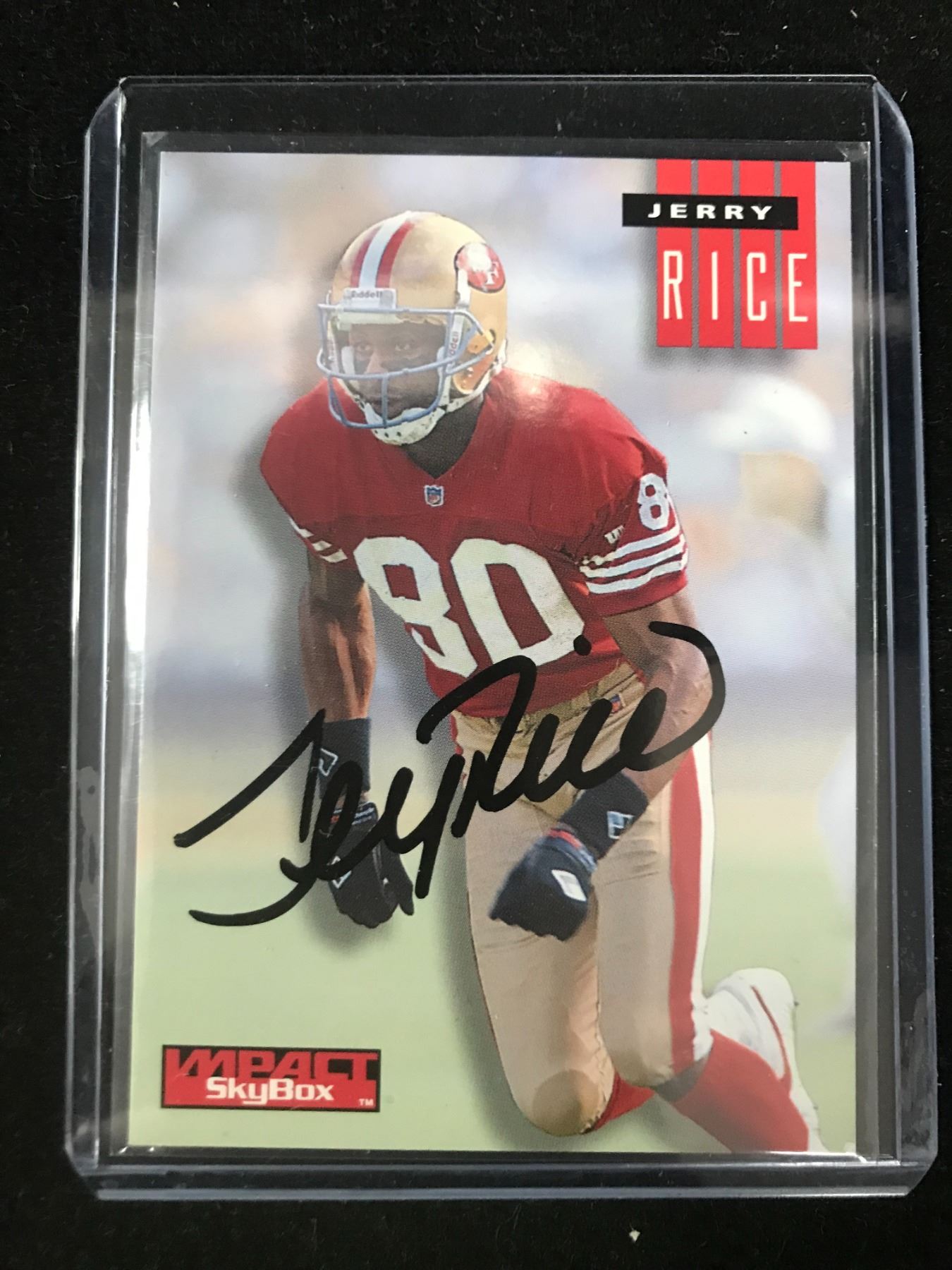 JERRY RICE SIGNED SKYBOX FOOTBALL CARD (PRO CERT COA)