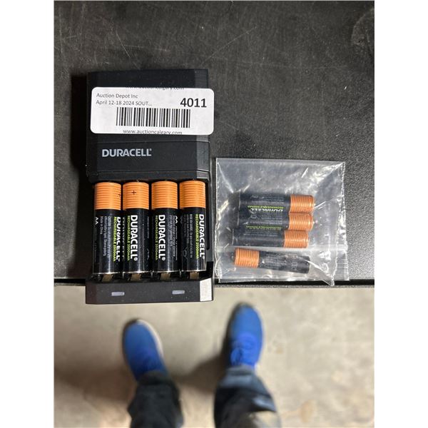 Lot of 4 AA rechargable Duracell batteries with charger and 4 AAA rechargable Duracell batteries