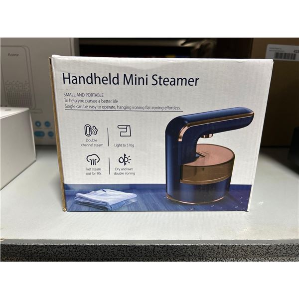 Handheld small and portable mini clothing steamer