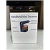 Image 2 : Handheld small and portable mini clothing steamer