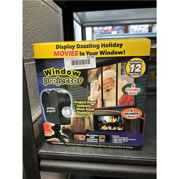 Holiday window movie projector, includes 6 Halloween movies and 6 Christmas movies