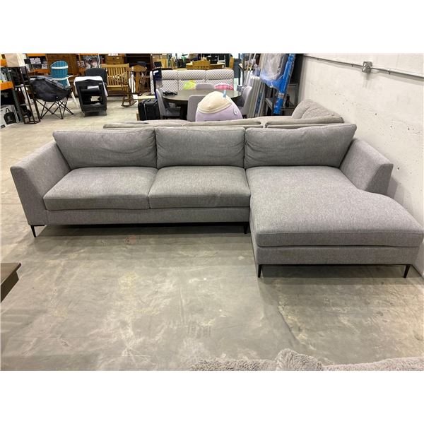 Grey upholstered sectional sofa / couch