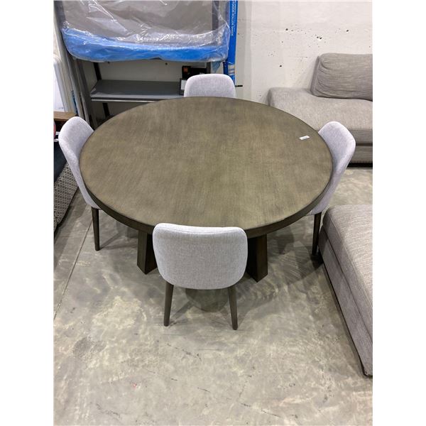 Solid wood round dining room table with 4 grey upholstered chairs